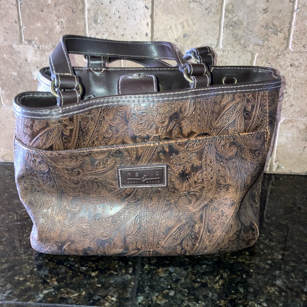Tooled leather relic purse